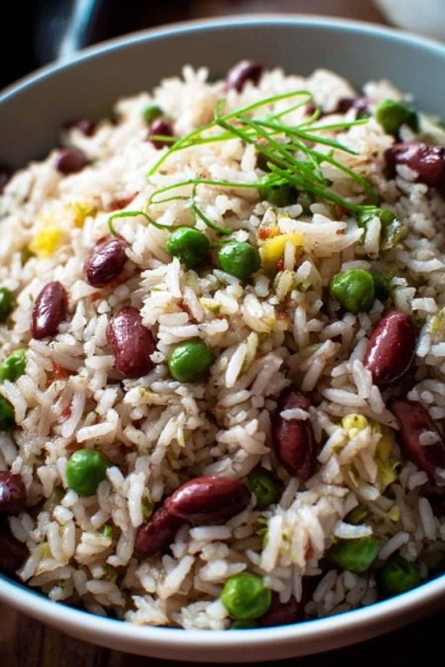 Delicious tangy rice and peas served in a bowl with herbs and spices.