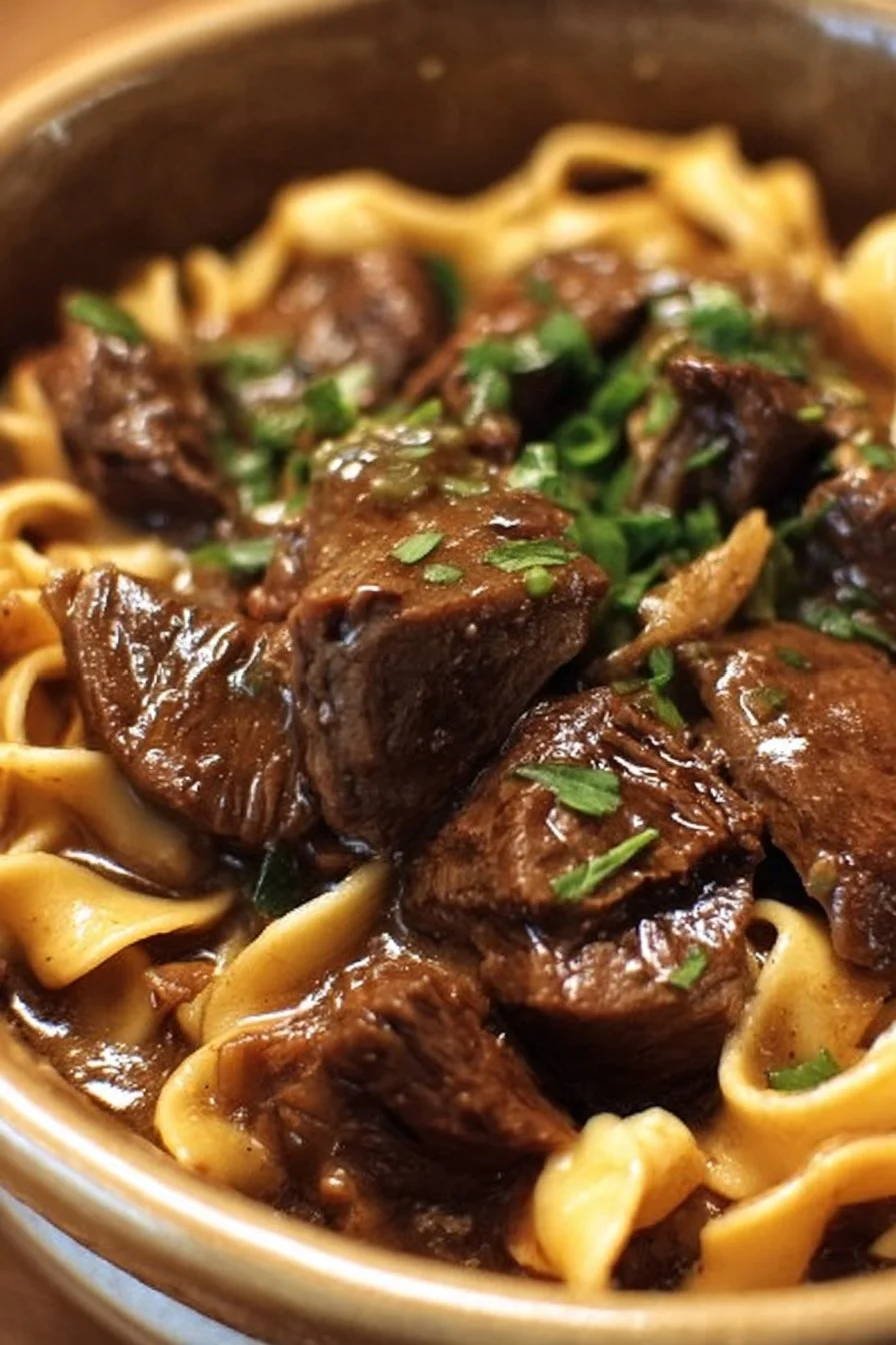 Crockpot Beef and Noodles with tender beef in a rich broth