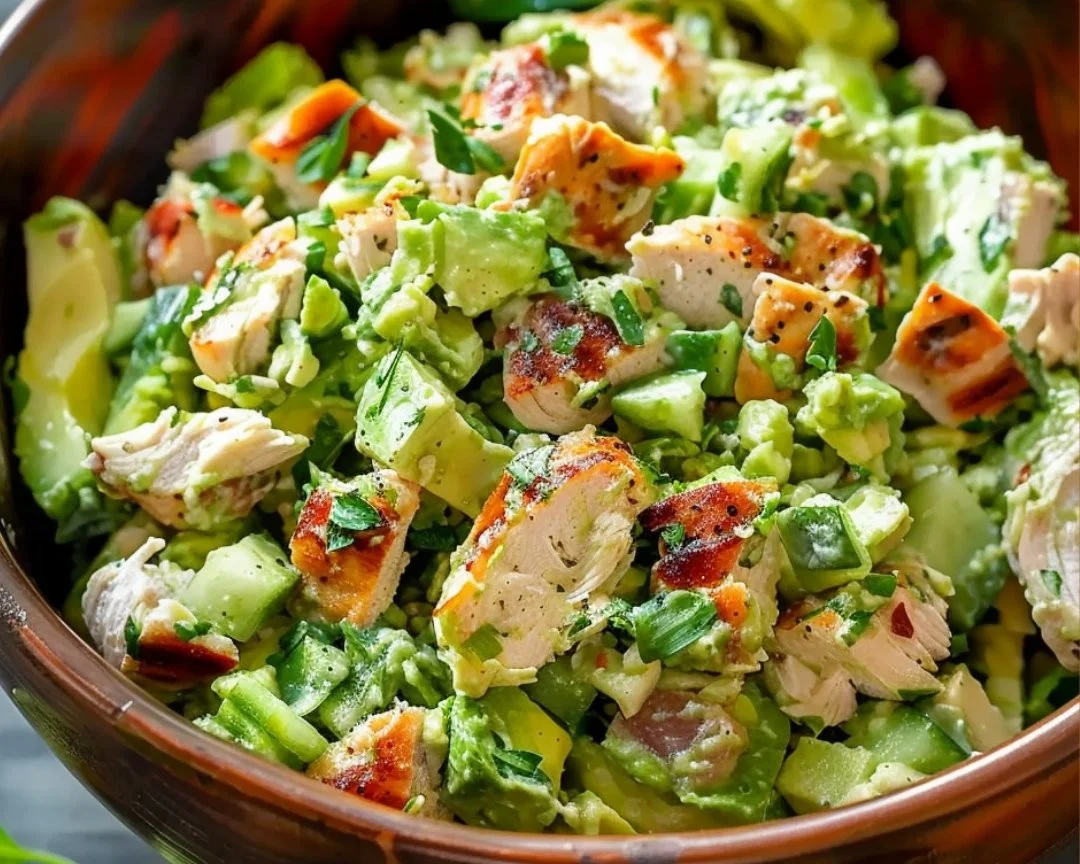 Freshly prepared Avocado Chicken Salad served in a bowl.