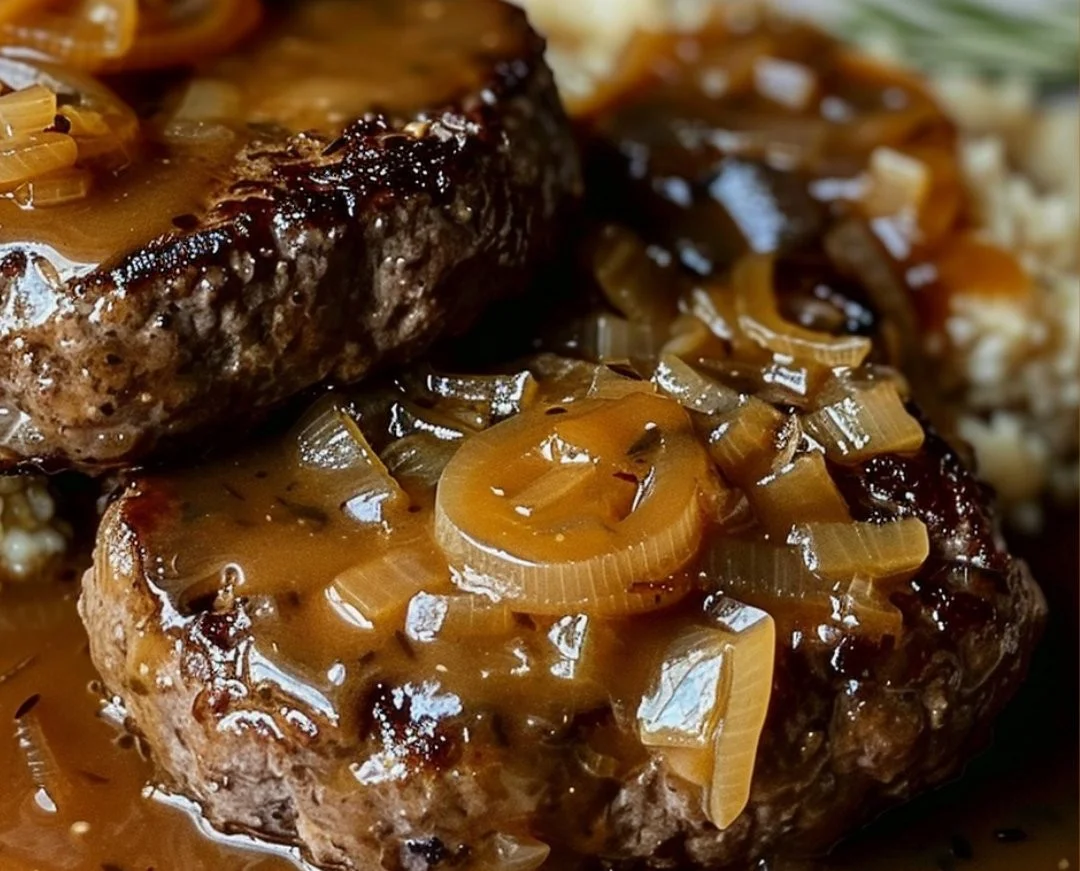Delicious hamburger steaks topped with savory onion gravy.
